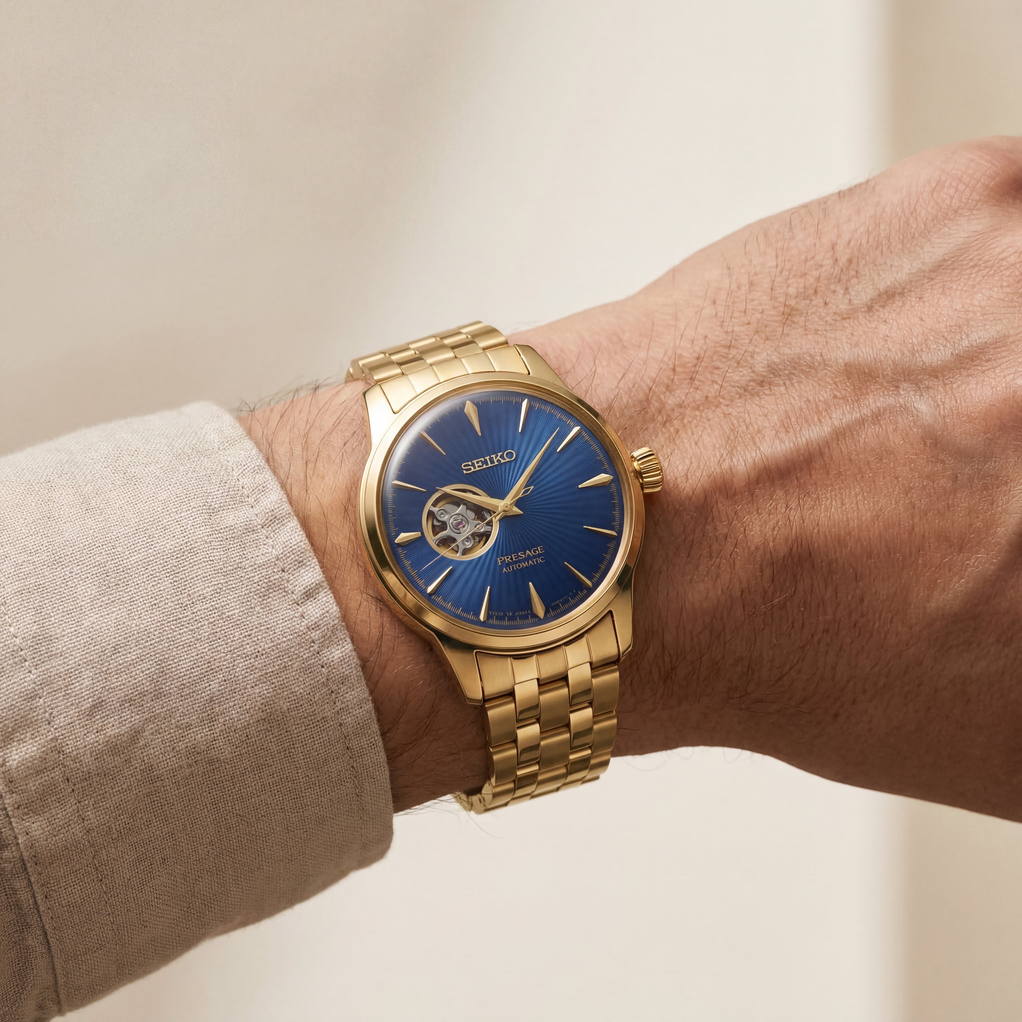 Gold Stainless Steel Case Royal Blue Sunburst Dial Open-Heart Automatic Luxury Bracelet Watch – Men