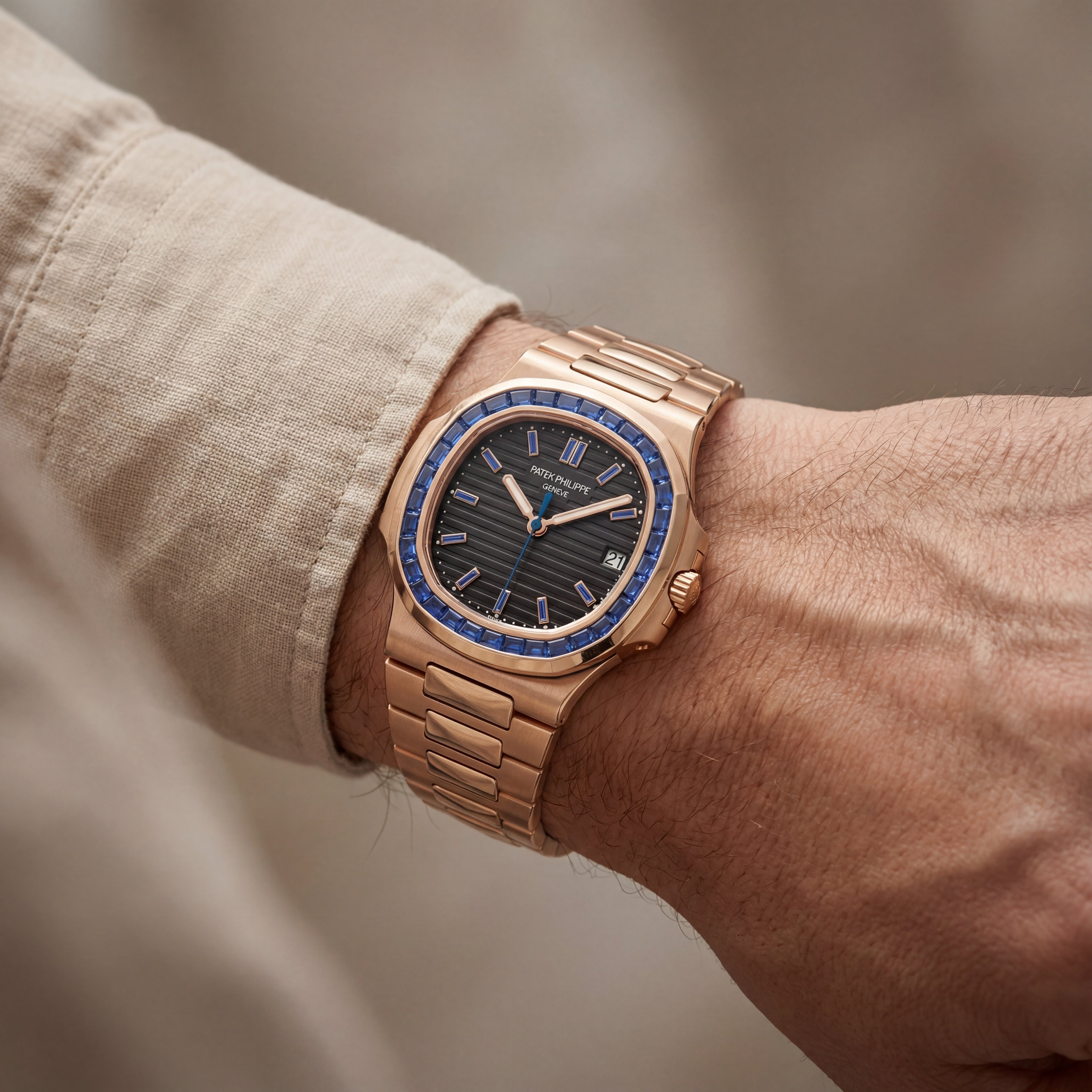 Rose Gold Stainless Steel Watch with Blue Gem Bezel & Black Dial