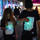 GlowCanvas Tee – Light-Activated Drawing T-Shirt