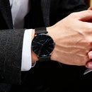 Men’s Ultra-Slim Black Mesh Strap Watch with Blue Accent Markers